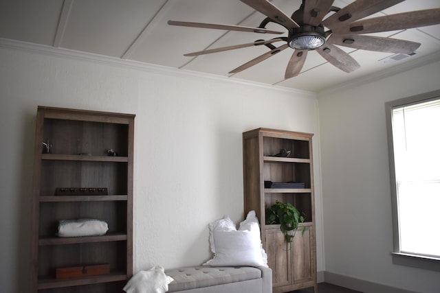 3785 S 2nd St, Onaway, MI 49765 - living area with ornamental molding, a ceiling fan, and visible vents