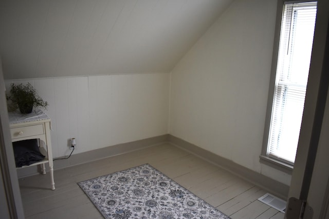 3785 S 2nd St, Onaway, MI 49765 - bonus room featuring vaulted ceiling, light wood-style flooring, and visible vents