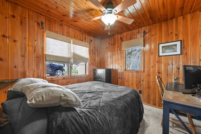 135 Alpena Trl, Houghton Lake, MI 48629 - bedroom featuring wooden walls, carpet flooring, wood ceiling, and a desk