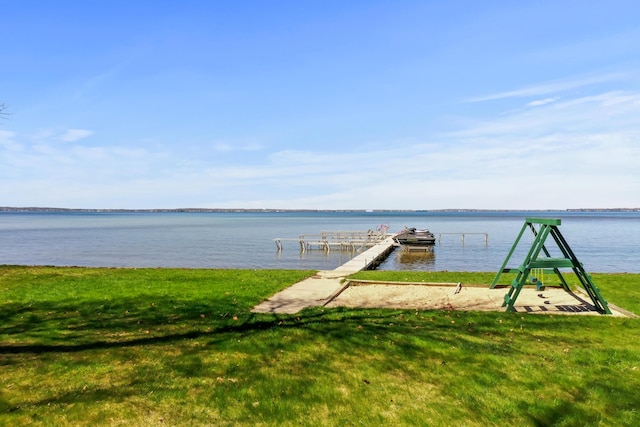 135 Alpena Trl, Houghton Lake, MI 48629 - dock area with a water view and a lawn