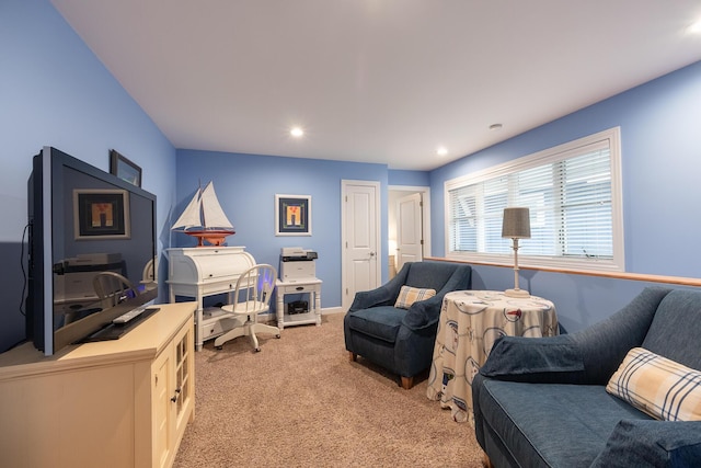 living room featuring light carpet and recessed lighting