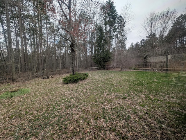 view of yard featuring fence