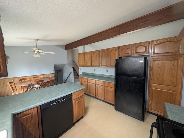 kitchen featuring black appliances, ceiling fan, a textured ceiling, brown cabinets, and light carpet