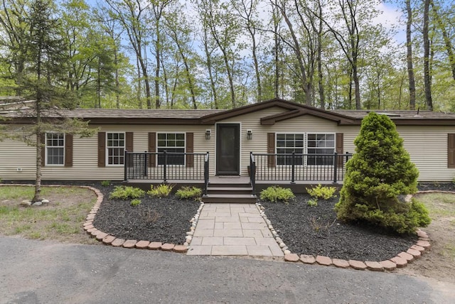1505 Shawnee Dr, Indian River, MI 49749 - view of front of property featuring a deck