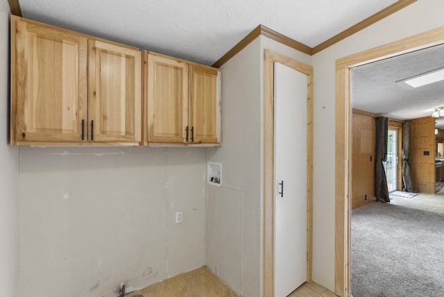 1505 Shawnee Dr, Indian River, MI 49749 - laundry area featuring cabinet space, hookup for a washing machine, crown molding, and a textured ceiling