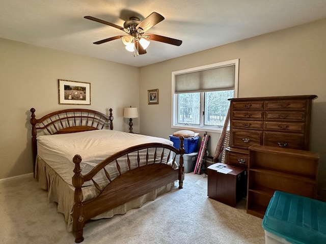 1243 Euclid Ave, Grayling, MI 49738 - bedroom featuring light carpet and ceiling fan