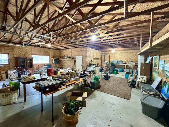 1243 Euclid Ave, Grayling, MI 49738 - misc room with concrete floors, vaulted ceiling, and plenty of natural light
