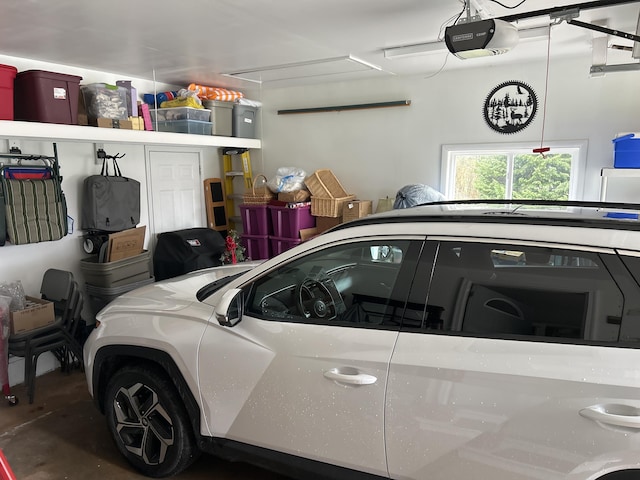 garage featuring a garage door opener