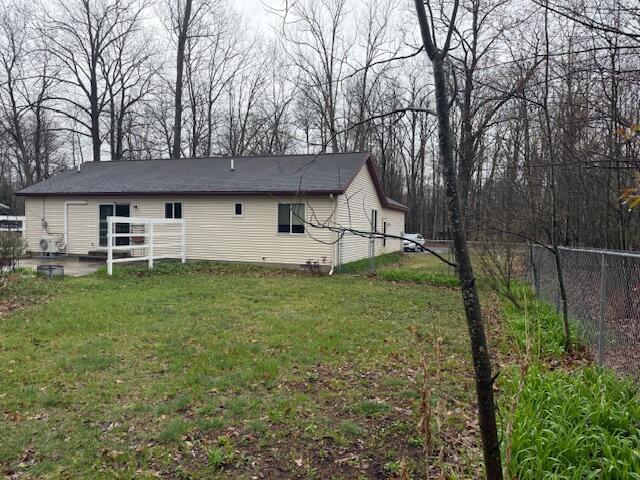 206 Great Oak Dr, Roscommon, MI 48653 - view of back of property