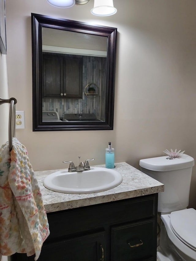 3143 Poplar Ave, Grayling, MI 49738 - bathroom with vanity and toilet