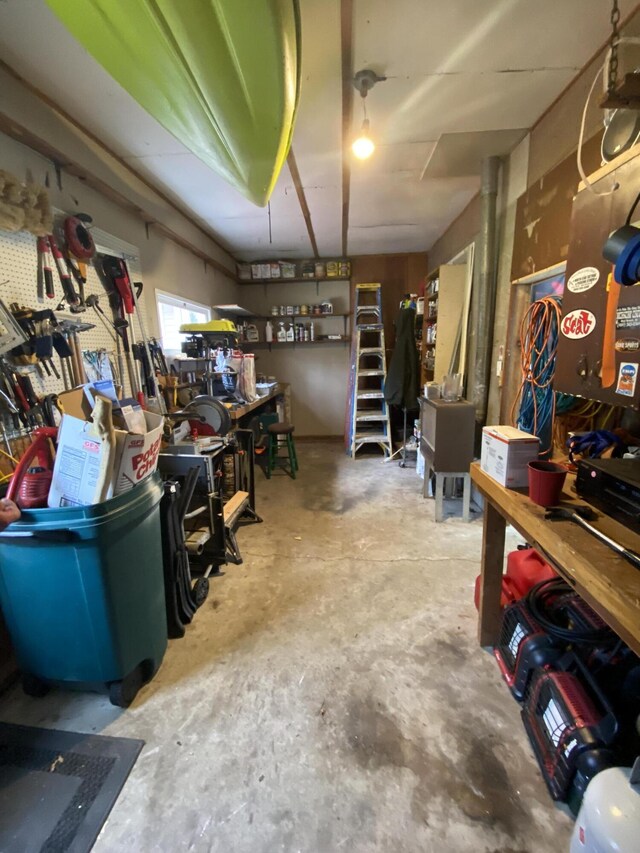 3143 Poplar Ave, Grayling, MI 49738 - garage featuring a workshop area