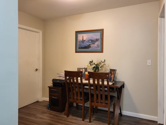 3143 Poplar Ave, Grayling, MI 49738 - dining space featuring dark wood-style floors and baseboards