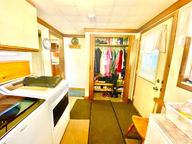 10328 Toohy Trl, Harrison, MI 48625 - washroom with separate washer and dryer and baseboards