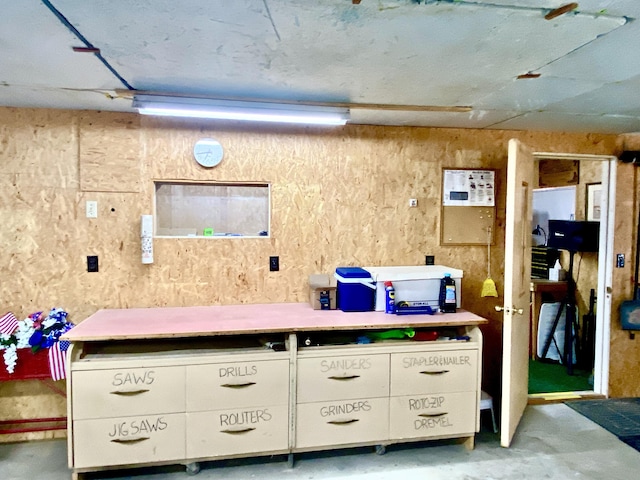 10328 Toohy Trl, Harrison, MI 48625 - miscellaneous room with unfinished concrete flooring