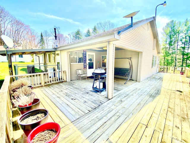 10328 Toohy Trl, Harrison, MI 48625 - deck featuring grilling area