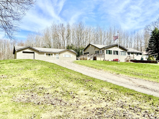 10328 Toohy Trl, Harrison, MI 48625 - single story home with driveway and a front lawn