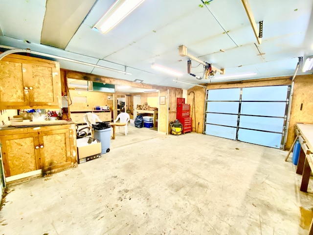10328 Toohy Trl, Harrison, MI 48625 - garage featuring a workshop area