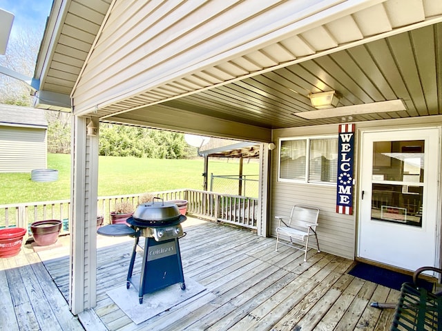 10328 Toohy Trl, Harrison, MI 48625 - deck with grilling area and a yard