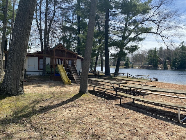 10328 Toohy Trl, Harrison, MI 48625 - view of yard featuring a playground and a water view