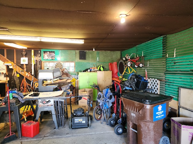 storage room featuring a garage and electric panel