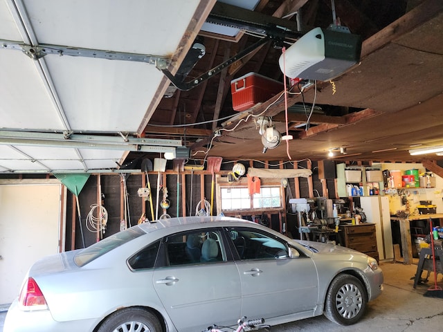 garage featuring a garage door opener