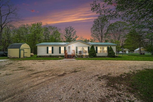 8978 Starvation Lake Rd, Mancelona, MI 49659 - manufactured / mobile home featuring metal roof