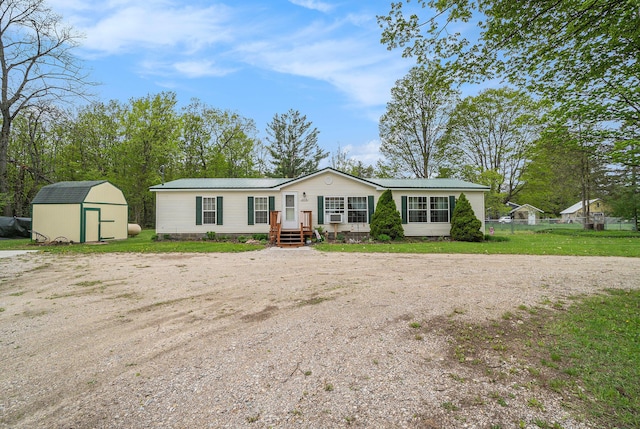 8978 Starvation Lake Rd, Mancelona, MI 49659 - manufactured / mobile home with metal roof