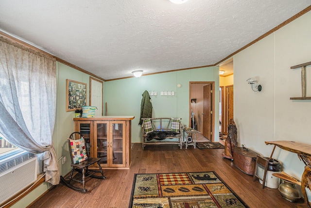 8978 Starvation Lake Rd, Mancelona, MI 49659 - office area featuring crown molding, wood finished floors, a textured ceiling, and cooling unit