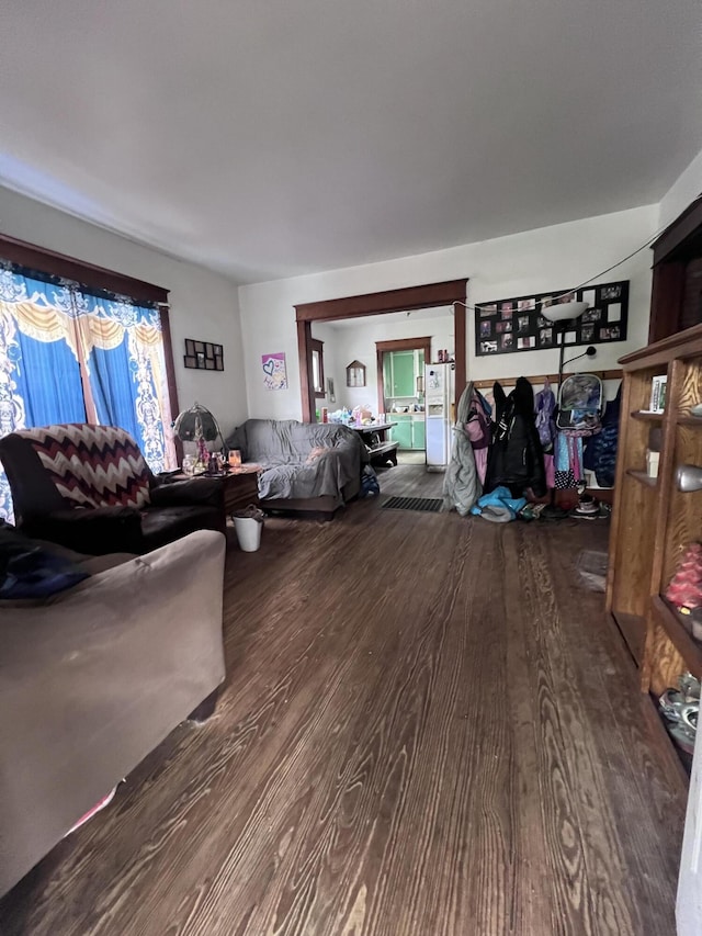 living room with wood finished floors