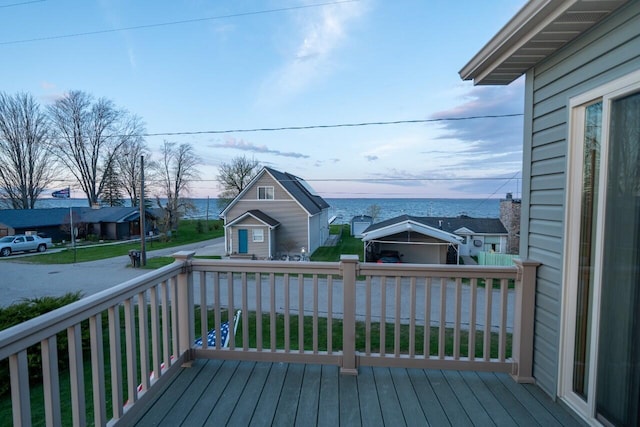 607 Shoreline Dr, Houghton Lake, MI 48629 - wooden terrace with a water view