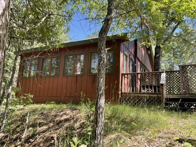 8842 Jackson Hole Trl, Grayling, MI 49738 - view of side of property with a deck