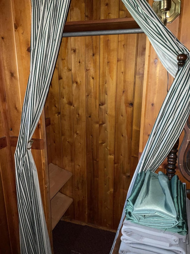 8842 Jackson Hole Trl, Grayling, MI 49738 - staircase with wood walls