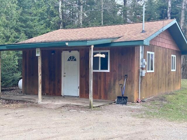 3120 Wilds Rd, Ossineke, MI 49766 - view of outdoor structure with a forest view