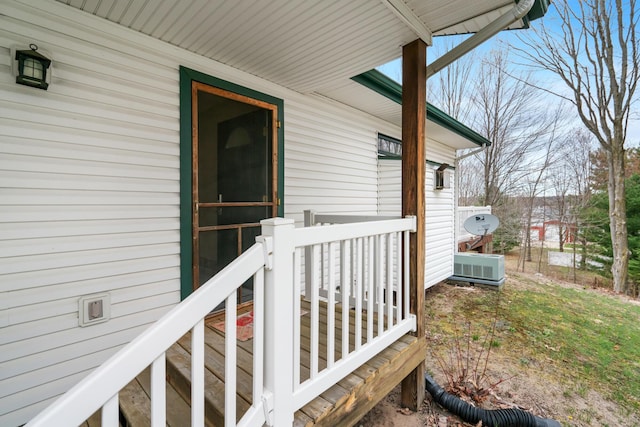 301 Hugh St, East Jordan, MI 49727 - doorway to property featuring a wooden deck