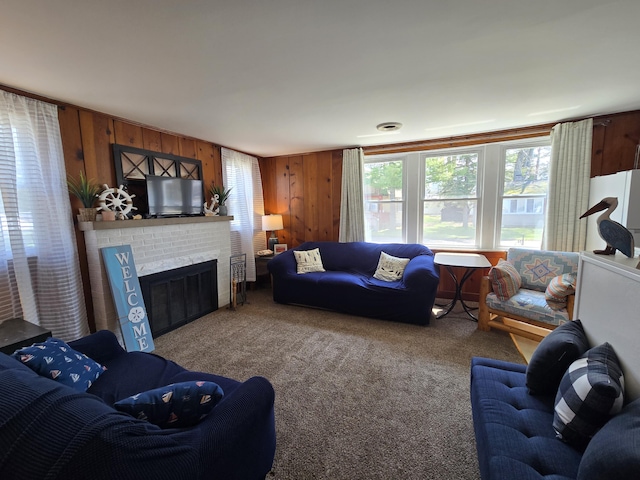 204 Broadway Rd, Houghton Lake, MI 48629 - carpeted living area with wooden walls and a brick fireplace
