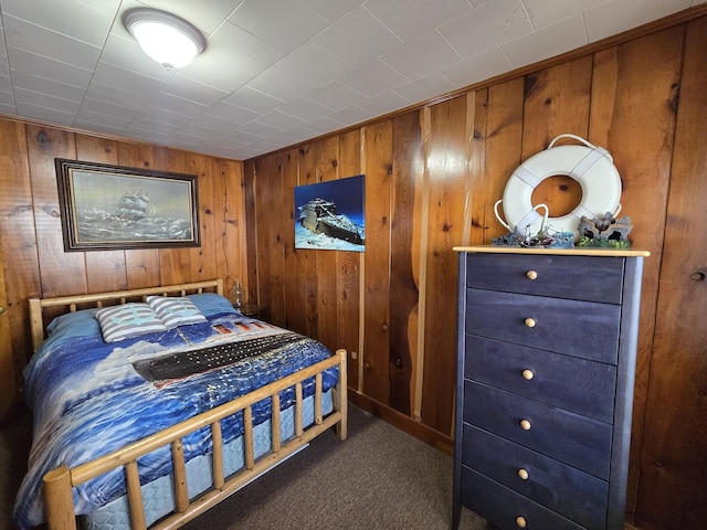 204 Broadway Rd, Houghton Lake, MI 48629 - carpeted bedroom featuring wood walls