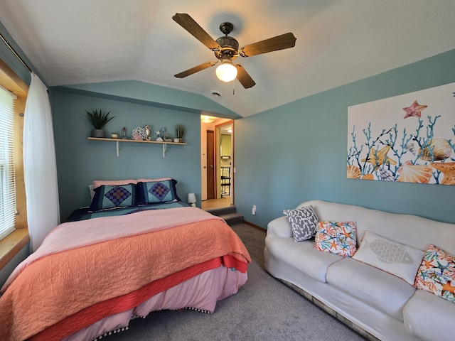 204 Broadway Rd, Houghton Lake, MI 48629 - carpeted bedroom featuring vaulted ceiling and ceiling fan