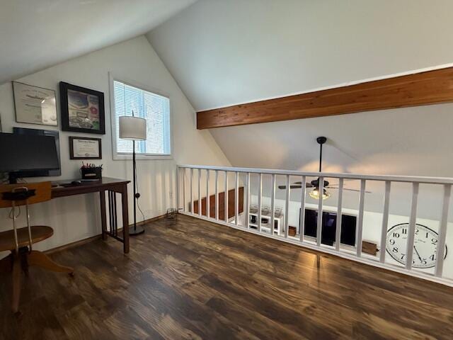 bonus room featuring vaulted ceiling, wood finished floors, and an office area