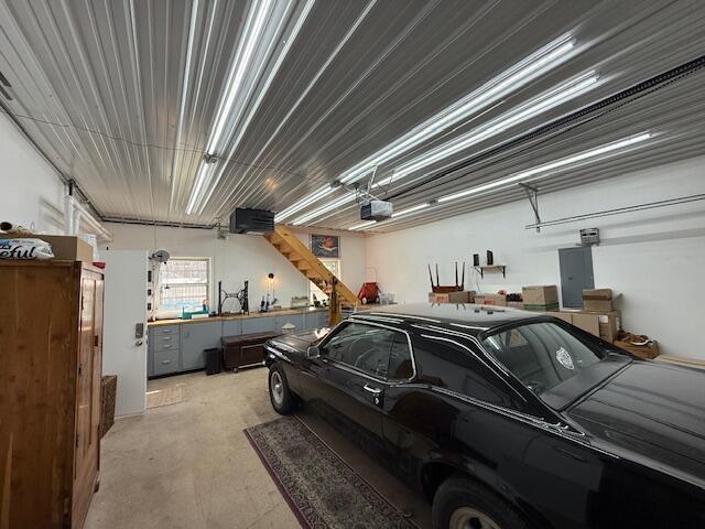 garage featuring a garage door opener