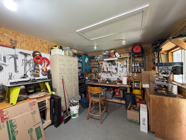 storage room featuring attic access