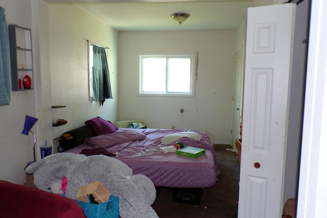 1220 Court St, Cheboygan, MI 49721 - bedroom featuring carpet