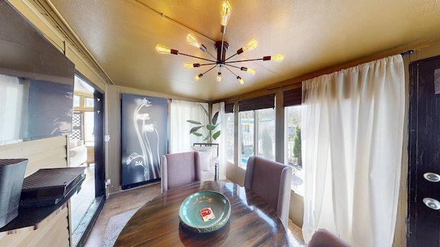 2757 Owens Dr, Houghton Lake, MI 48629 - sunroom featuring a chandelier