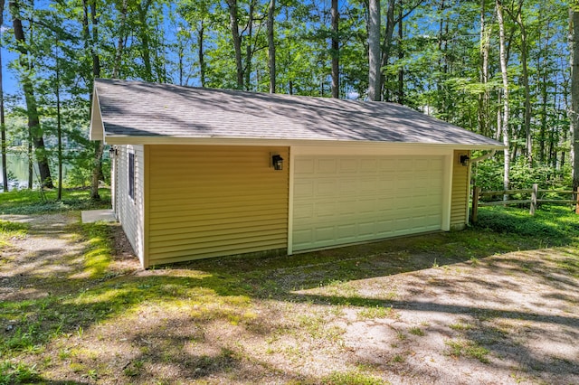 2403 N Perch Lake Dr, Gaylord, MI 49735 - detached garage featuring fence