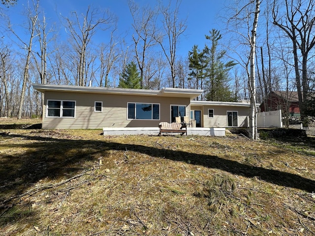 2403 N Perch Lake Dr, Gaylord, MI 49735 - rear view of property featuring a deck