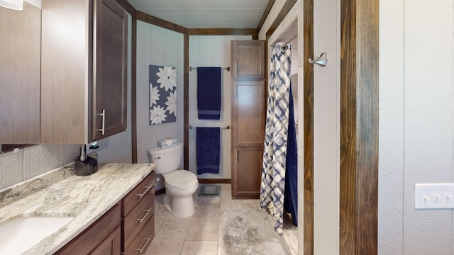 3400 Thornapple Trl, Lewiston, MI 49756 - bathroom with toilet, vanity, and curtained shower