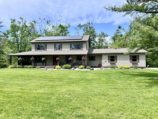 3400 Thornapple Trl, Lewiston, MI 49756 - farmhouse inspired home with solar panels, covered porch, and a front lawn