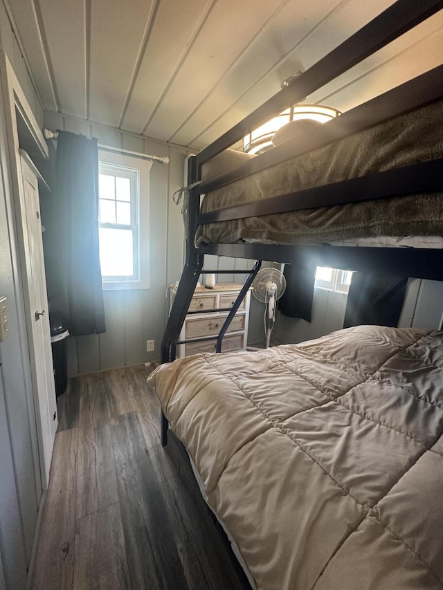 bedroom with wood finished floors