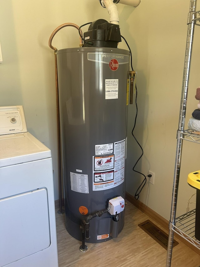 utilities featuring washer / dryer and water heater