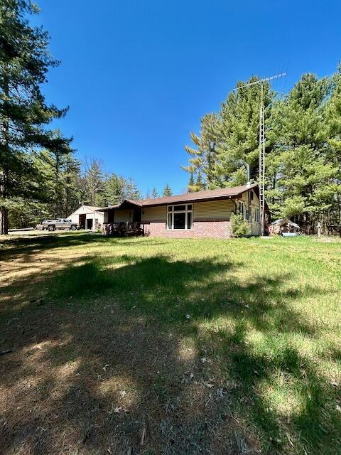 2165 E Cherry Creek Rd, Fairview, MI 48621 - view of grassy yard