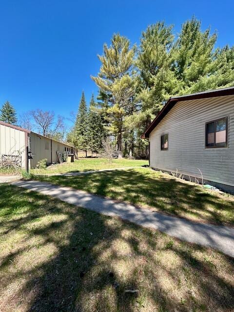 2165 E Cherry Creek Rd, Fairview, MI 48621 - view of grassy yard